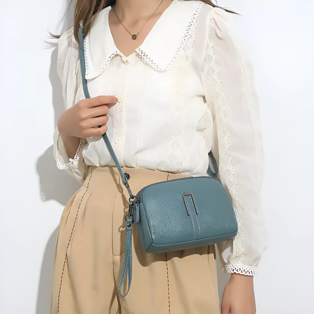 Genuine leather women's square shoulder bag in dark khaki colour, showing structured horizontal shape.