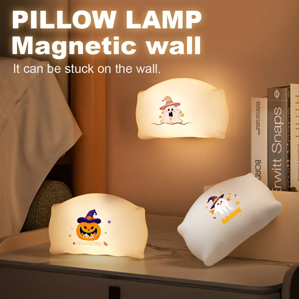Small cartoon ghost doll table lamp with warm light, showing Magic Ghost and Pumpkin Ghost colour options.