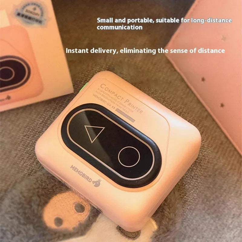 Avocado green Bluetooth mini thermal printer for mobile phones, shown with thermal paper and charging cable.