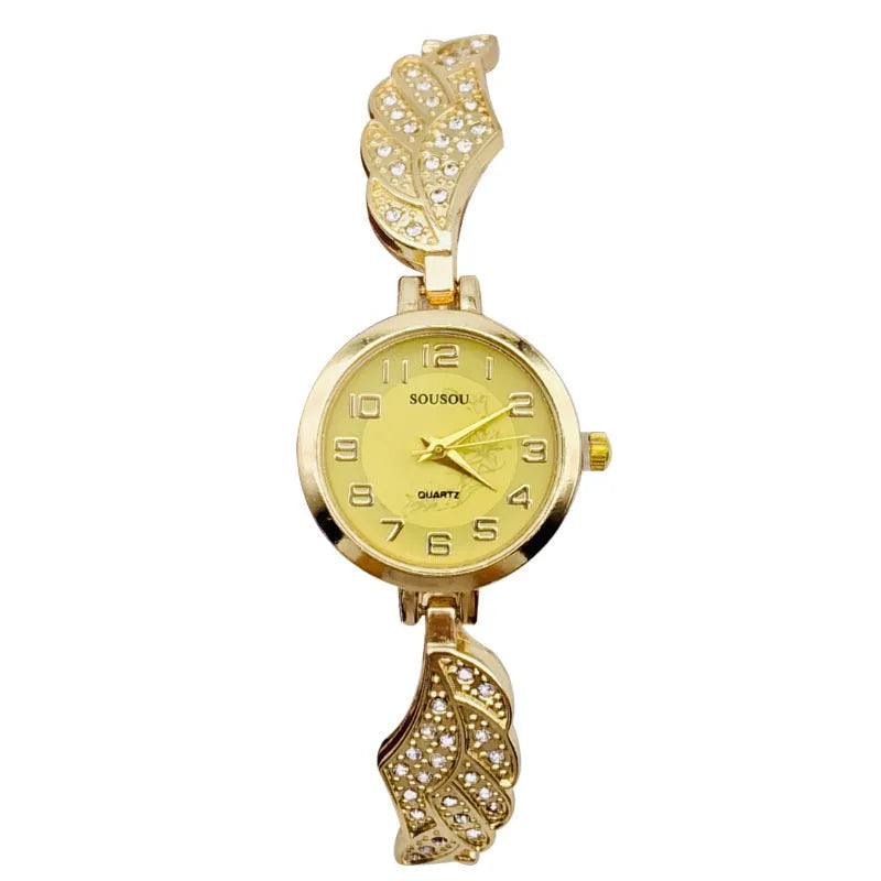 Stainless steel women's watch with round dial and Vachette clasp in gold, black and gold, or gold and white.