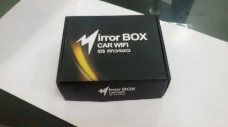 Black car mirror link box Wi-Fi converter with power cable, antenna, AV cable, and user manual for smartphone screen mirroring.