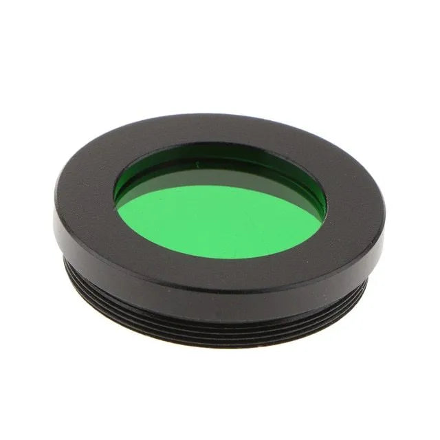 Set of six telescope eyepiece colour filters: green, blue, red, yellow, purple, black on white background