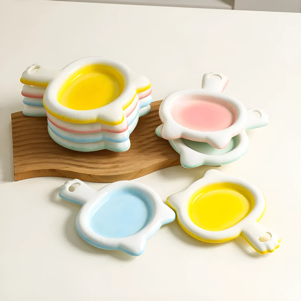 Ceramic cat bowl with shallow design in selected colour showing curved edges for spillage reduction