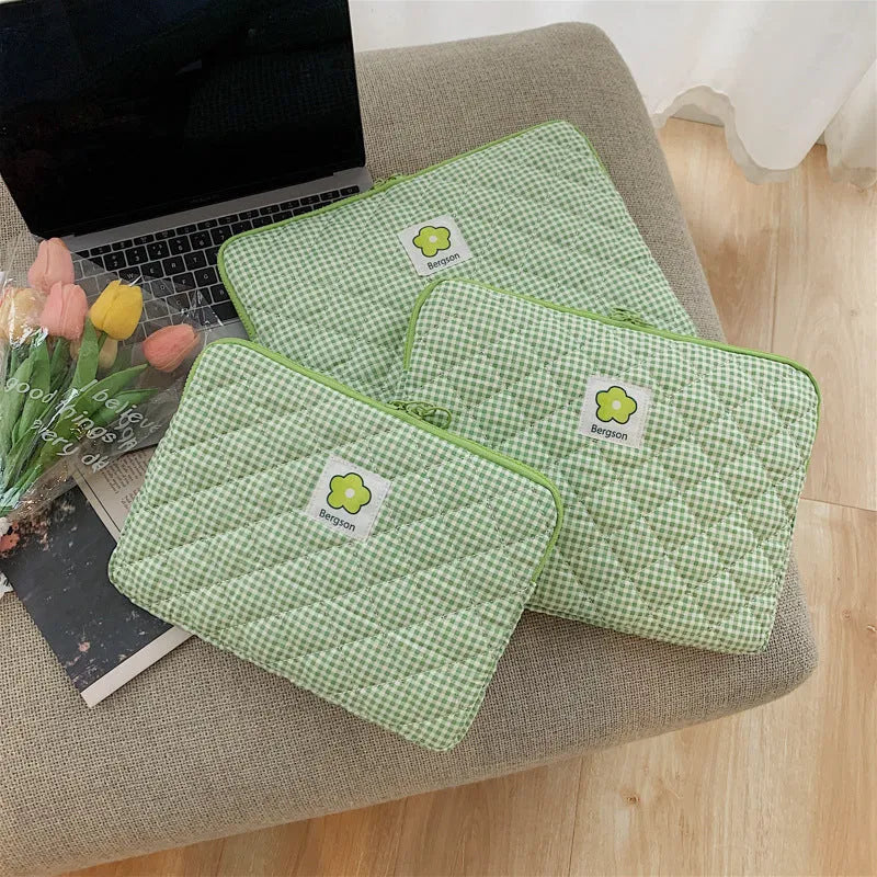 Cotton handbag for tablet with zipper in green flower pattern on white background