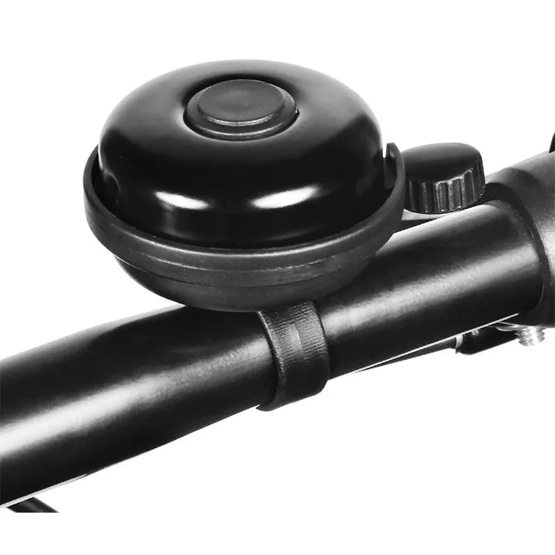 Black bicycle bell with 58mm diameter and thumb-operated mechanism for handlebar mounting