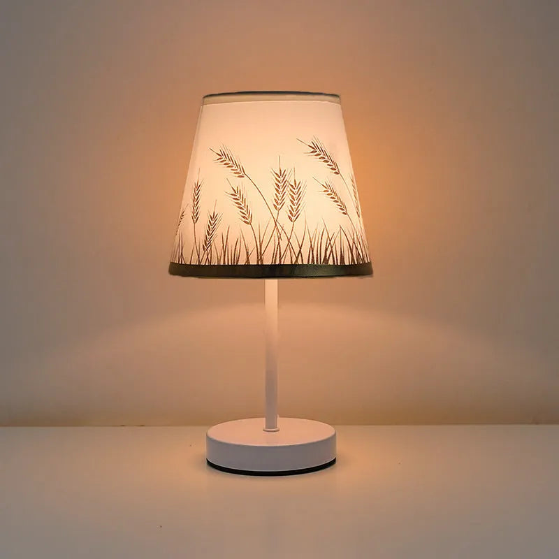 Solid wood fabric bedside lamp with rechargeable touch dimming and three colour light options on a nightstand