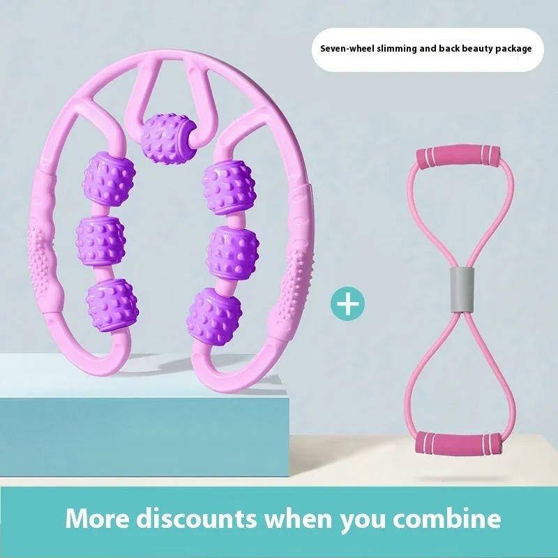 Handheld leg massager roller with multiple wheels in pink or purple on a table.