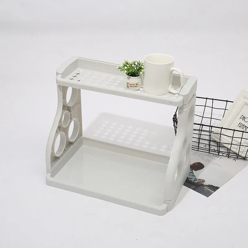 Foldable pink PP kitchen storage shelving unit with multiple tiers for organisation.