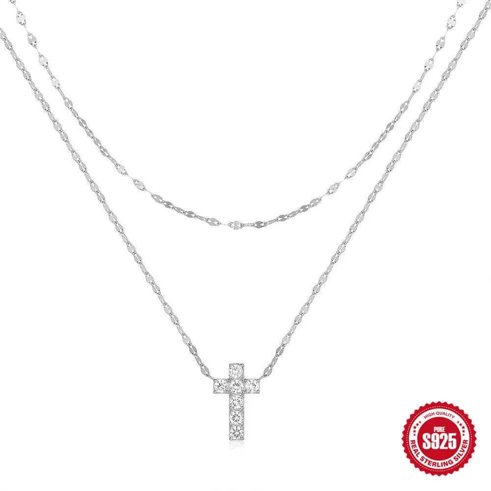 S925 sterling silver double-layer cross pendant necklace with twin diamonds on a clavicle chain.