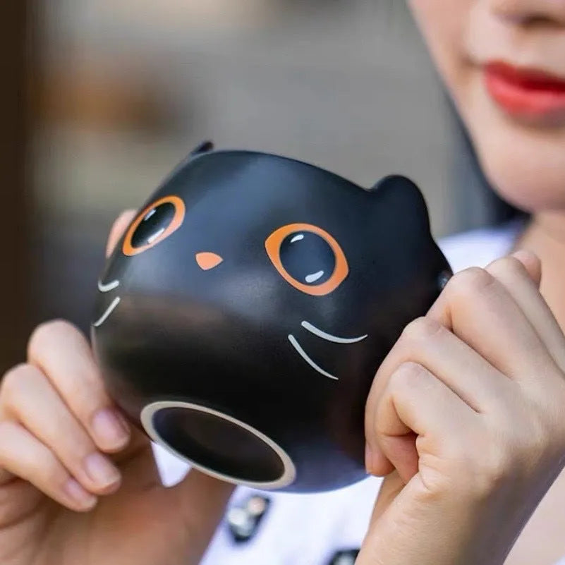 Black ceramic mug with cat-shaped pumpkin lid and spoon, 355ml capacity