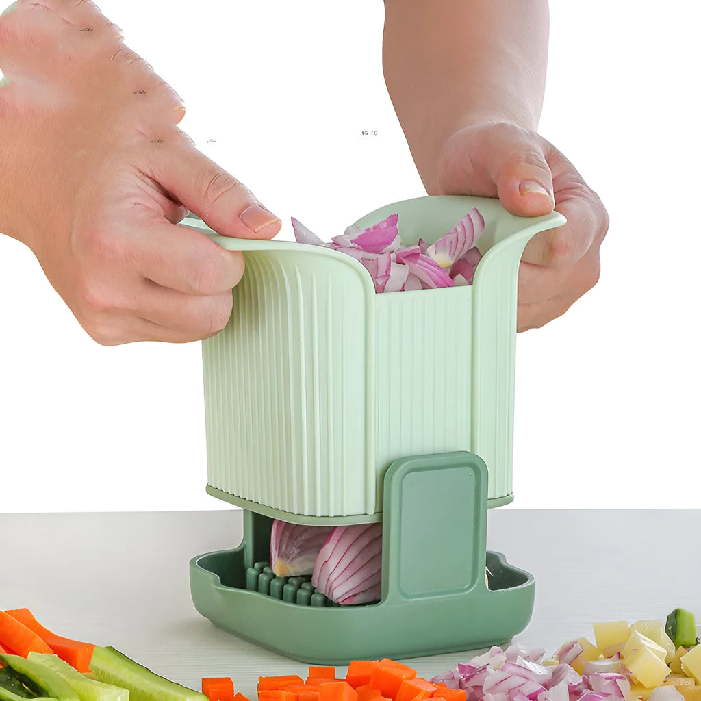 Green manual vegetable chopper for slicing onions, potatoes, radishes, and cucumbers with hand pressure operation