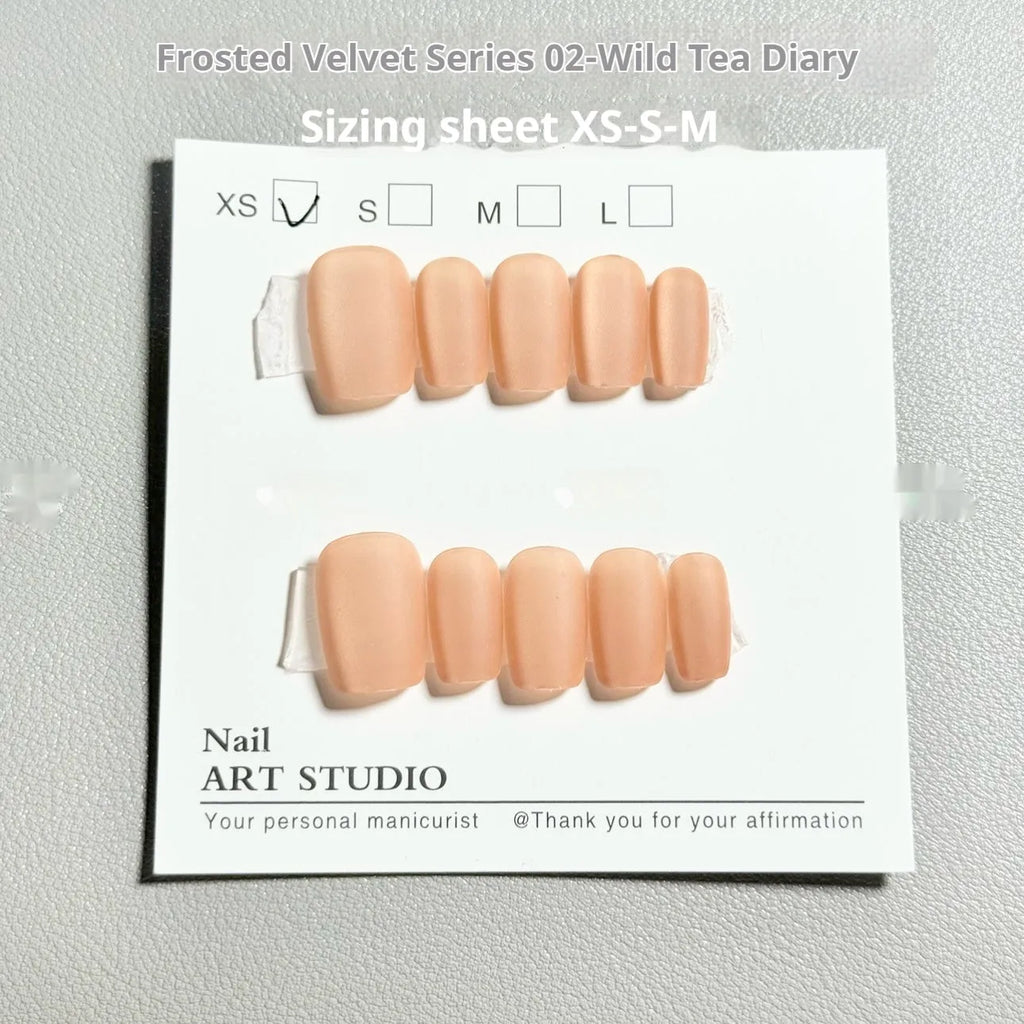 Frosted velvet Cat's Eye aurora effect press-on nails in short ladder shape.