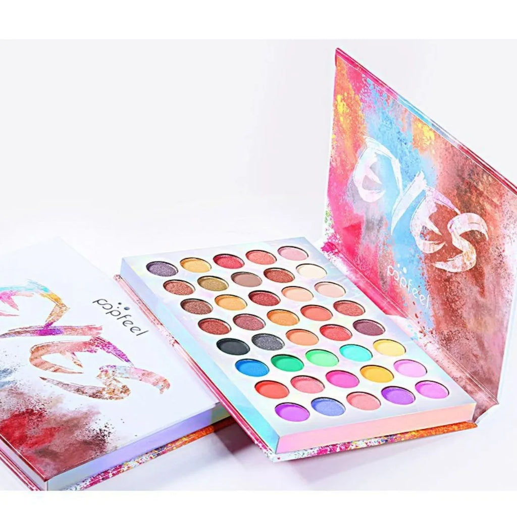 Shimmer matte multi-colour eye shadow palette with ten shades including purple, blue, black, sky blue, caramel, watermelon red, cameo brown, and peacock blue