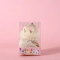 Cat wearing princess crown headdress with veil in beige or pink colour for wedding celebrations