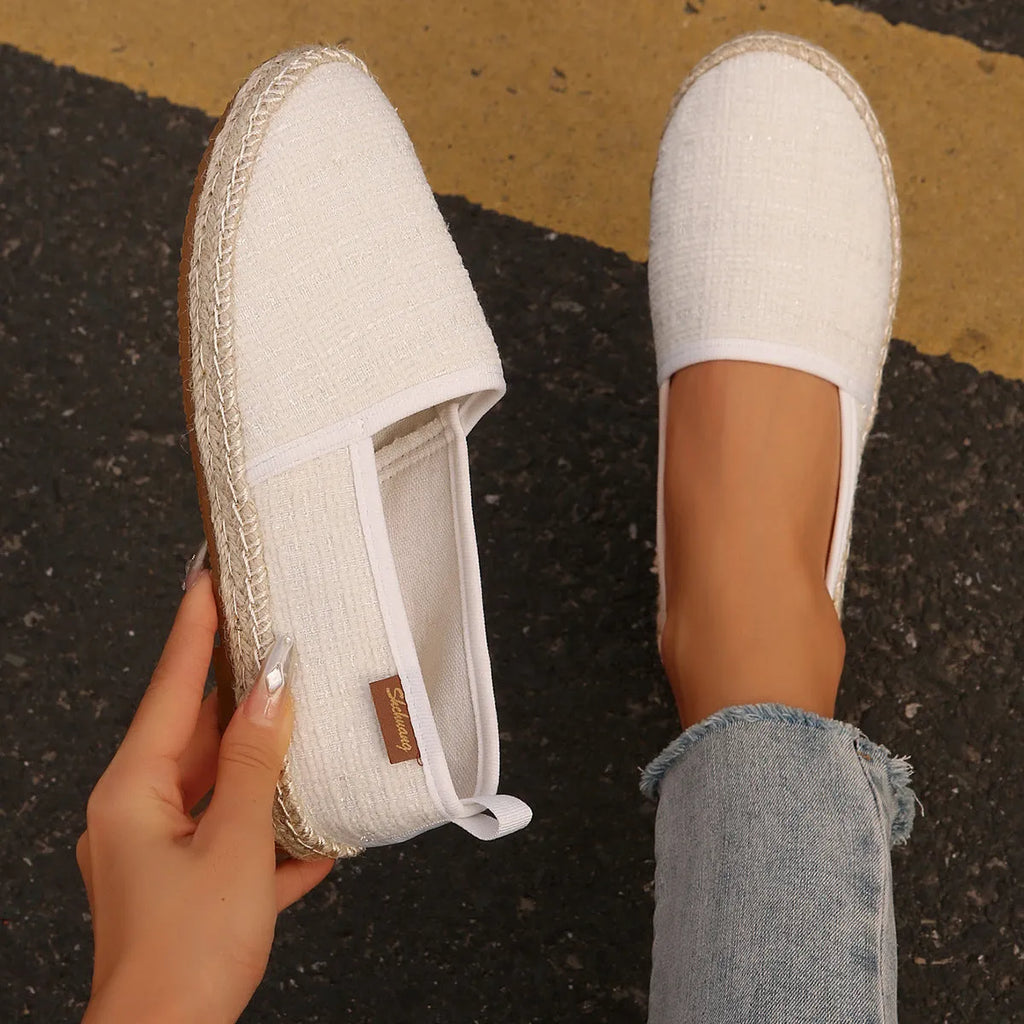 Casual fisherman shoes with canvas upper and rope sole in black, white, or beige colours