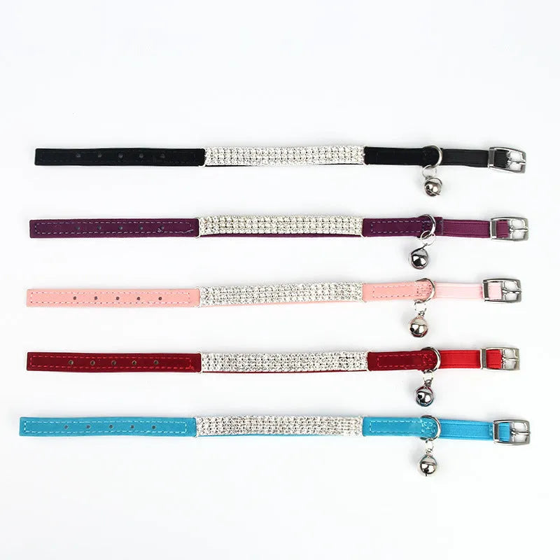 Adjustable velvet cat collar with rhinestones in red, blue, purple, black, or pink.