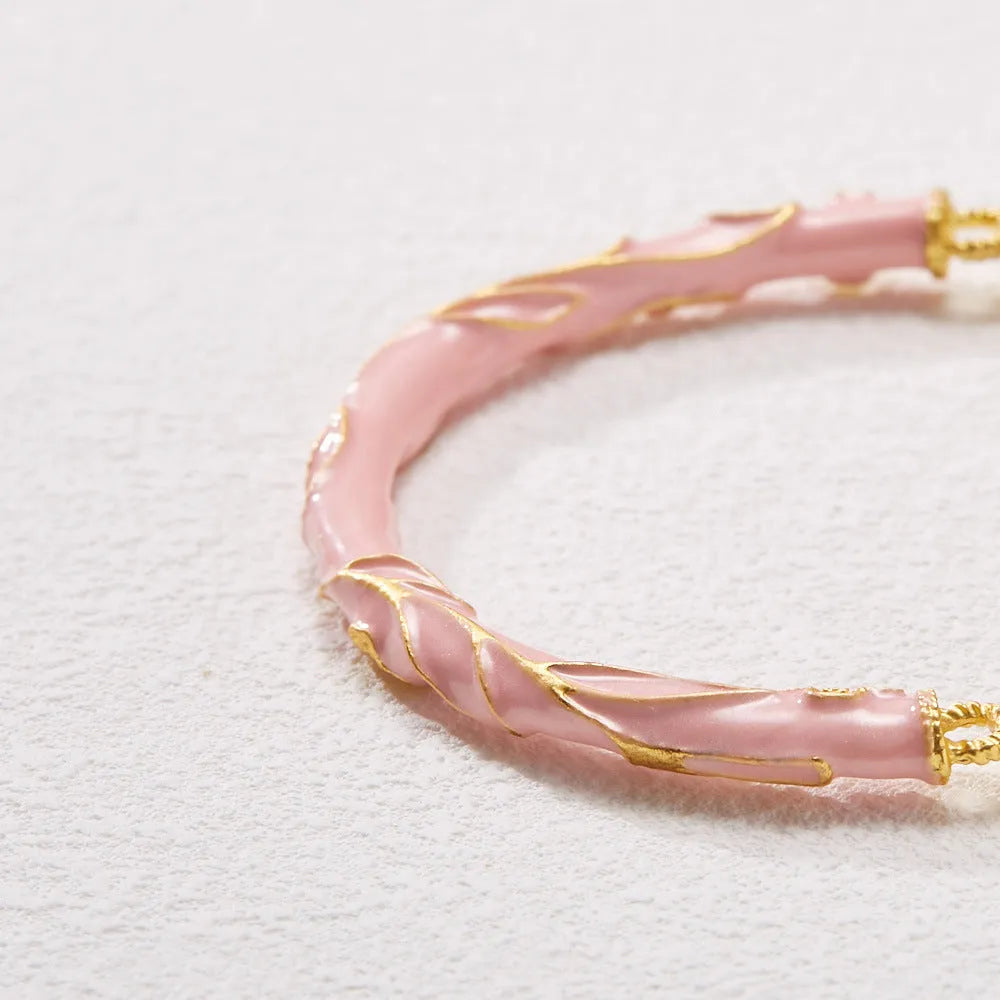 Chinese style sunstone jade bracelet with lily pattern and geometric gold thread design