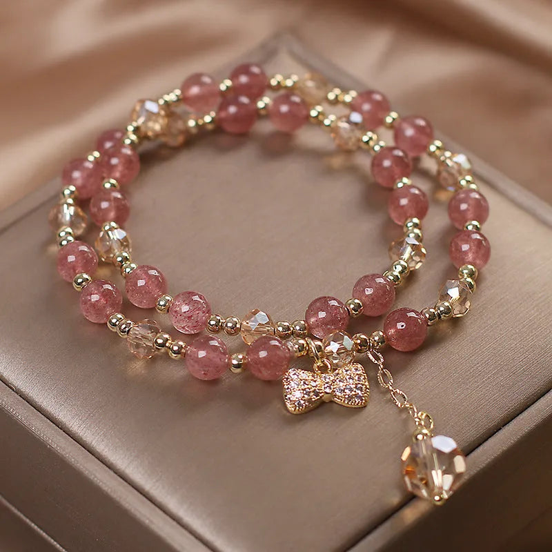 Double layer strawberry quartz bracelet with lucky cat charm in red cat's eye flowers colour