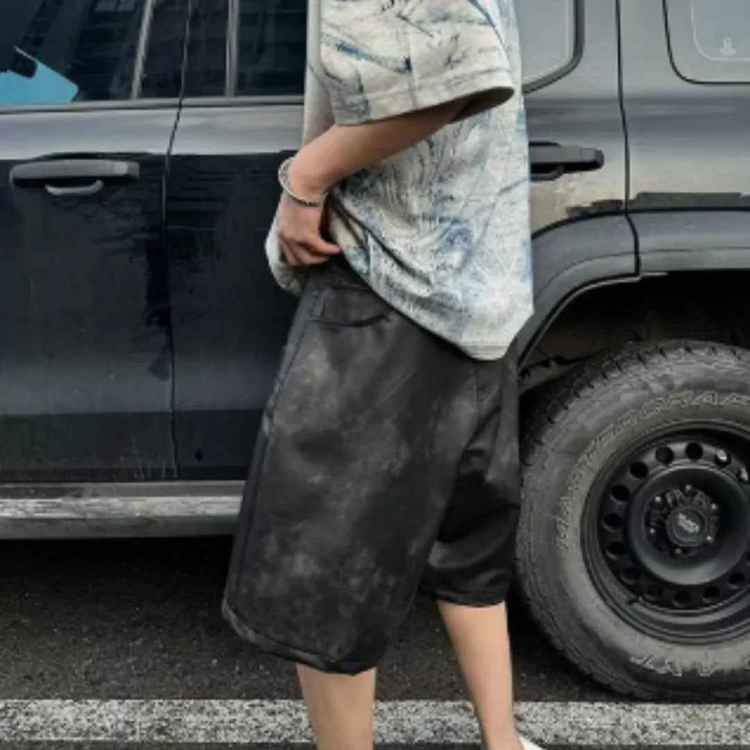 Plain solid colour loose fit t-shirt on a hanger, front view showing round neck and short sleeves.
