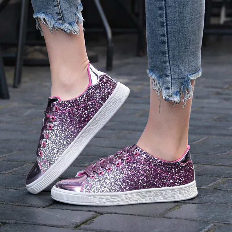 Women's black sequinned low-top lace-up shoes with a round toe and rubber sole