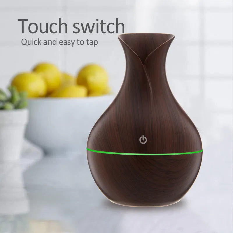 Vase humidifier 130ml 5V 3W in crackle mahogany or wood grain finish on a desk