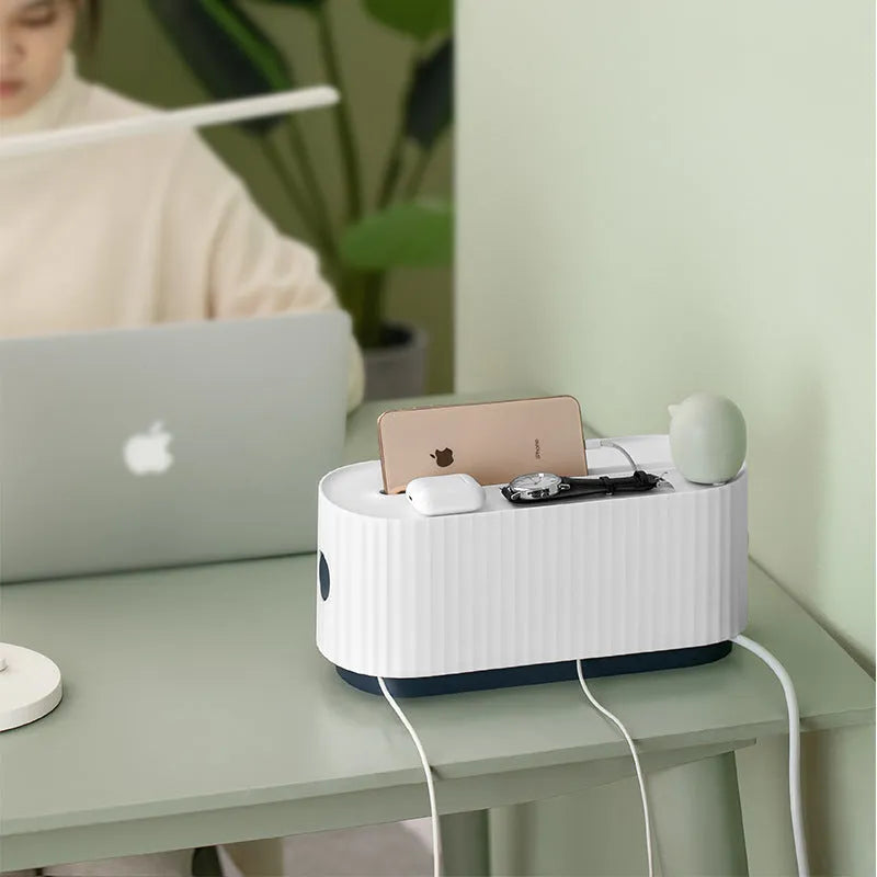 Blue and white desktop power strip storage organiser box with cable holes and a detachable cover.