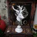 A natural resin animal ornament for home decoration in black, white, or wood colour, 32cm tall.