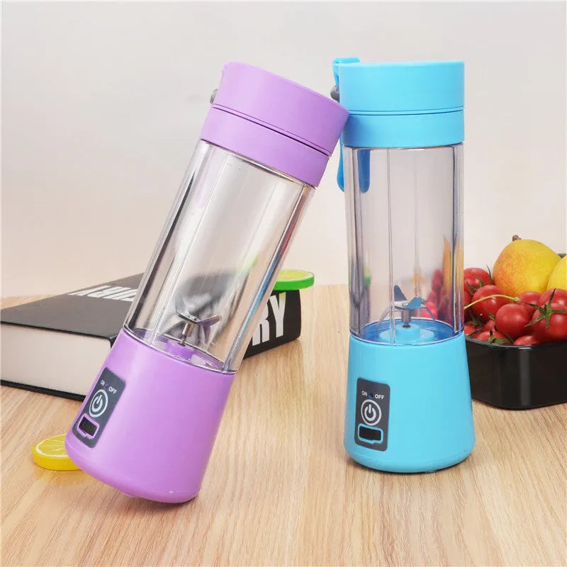 Mini USB electric citrus juicer with carry rope in pink, purple, blue, or green colours