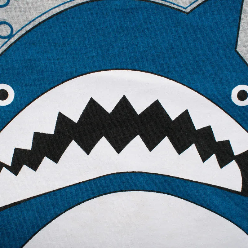 Grey cotton children's T-shirt shown with a size chart listing measurements for heights 90cm to 140cm.