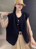 Women's loose fit polyester sleeveless vest in milky white with a visible pocket detail.