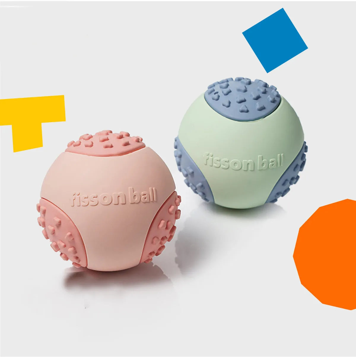 Green and pink 64mm rolling ball dog toy with smart motion technology