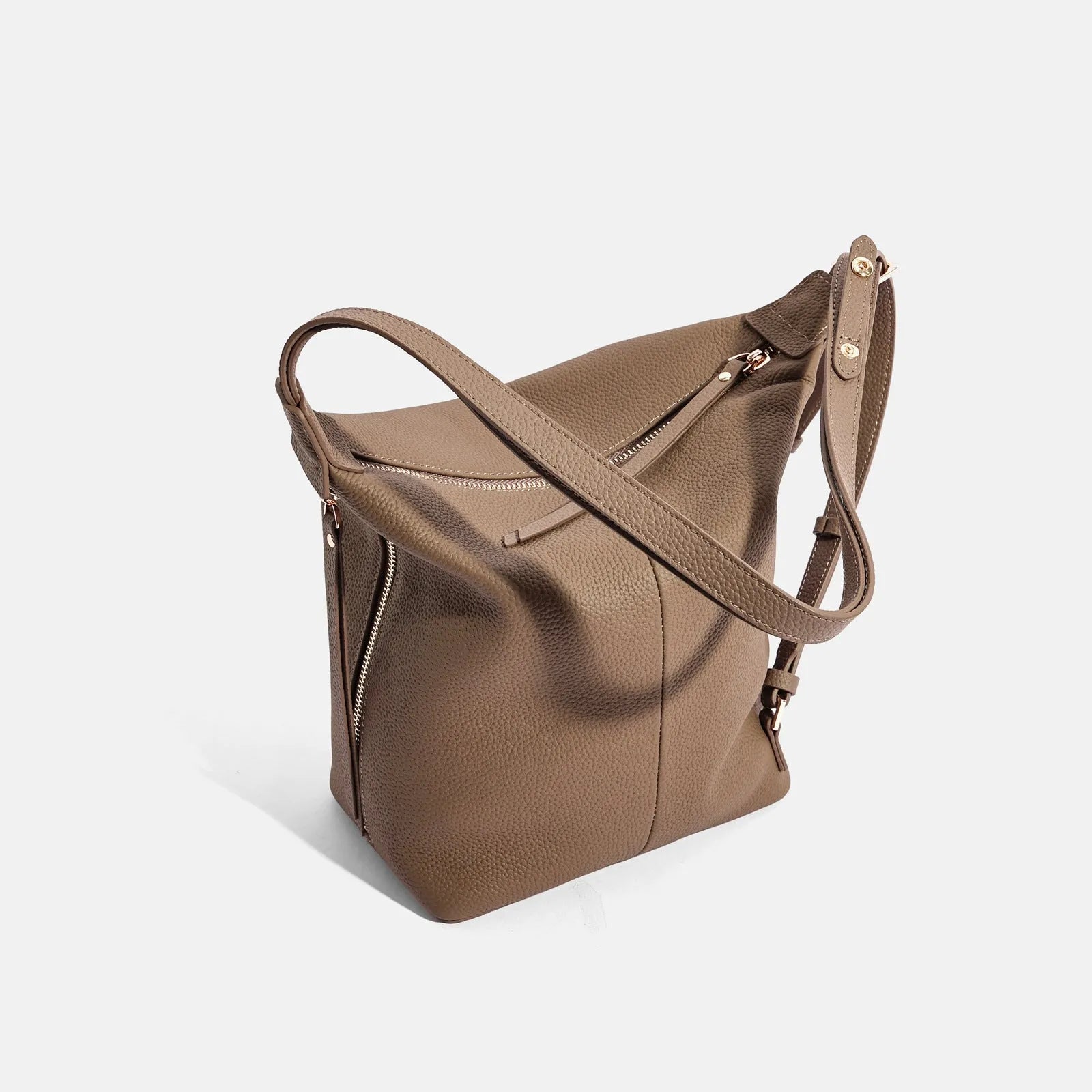 Women's soft genuine leather large bucket bag in elephant grey colour showing bucket silhouette and shoulder strap