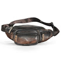 Brown leather shoulder messenger bag with a single strap and top flap closure.