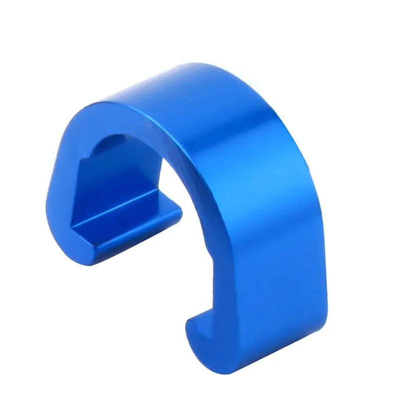 Set of ten small aluminium alloy C-shaped buckles in assorted colours on a white background.