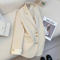 Korean-style women's coat in milky white with loose fit and pockets