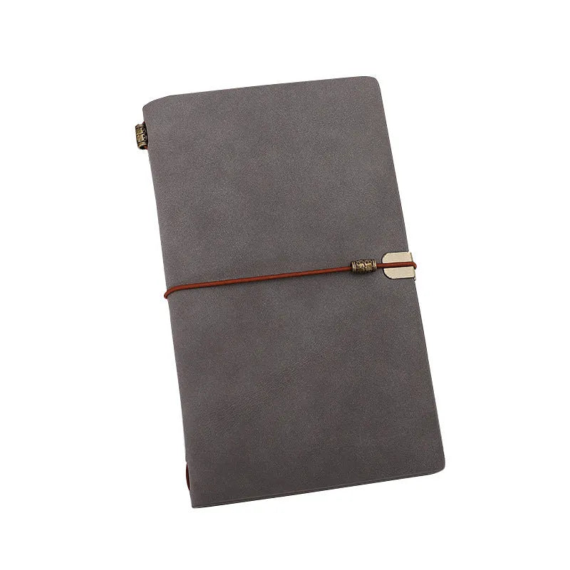 Grey cowhide rope bound A6 diary notebook open to show inner pages.