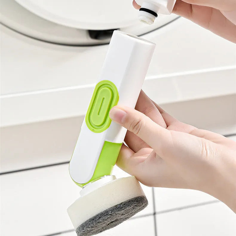 White and red long-handle kitchen brush with liquid dispenser button and two removable brush heads.