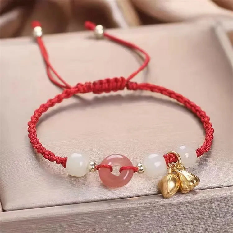 Hetian Jade constellation bracelet with two buckle closures on an adjustable strap.