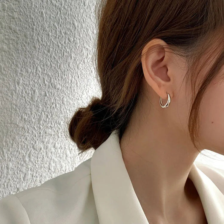 Retro-style geometric water drop earrings for women in gold and silver finishes, showing large, medium, and small sizes.