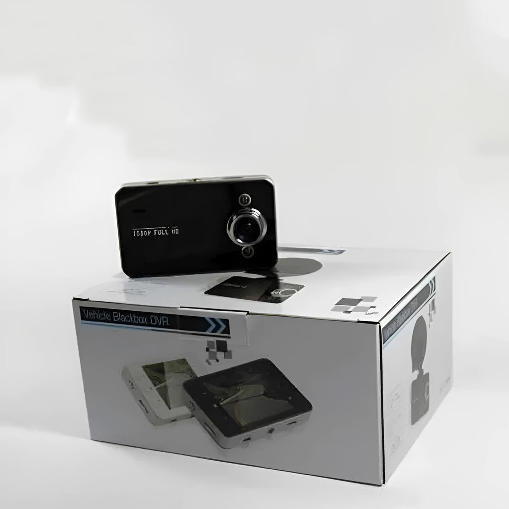 K6000 car dash cam with 120 degree wide angle lens mounted on front windshield in black finish