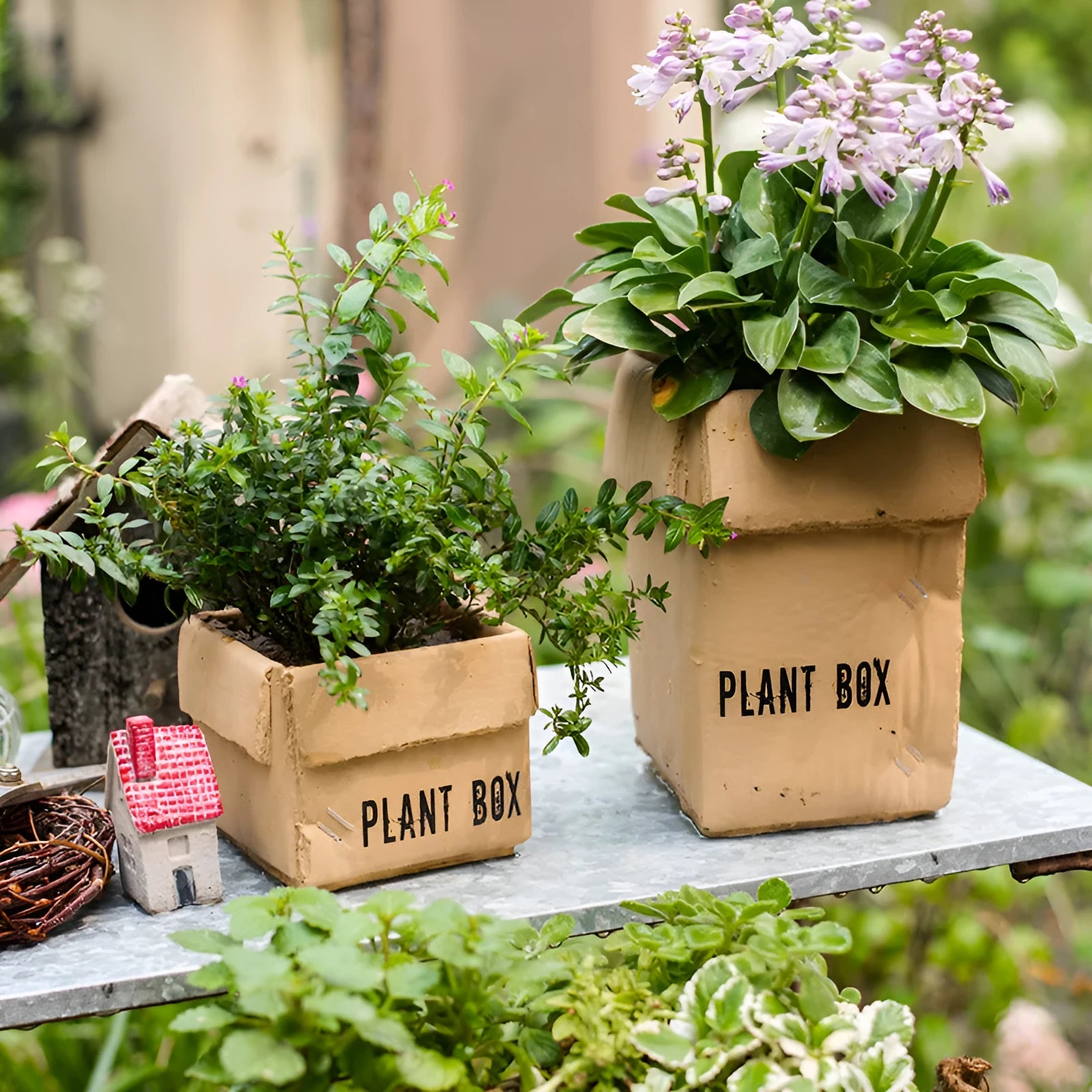 Cement flowerpot with brown paper carton design and drainage hole for indoor balcony plants.