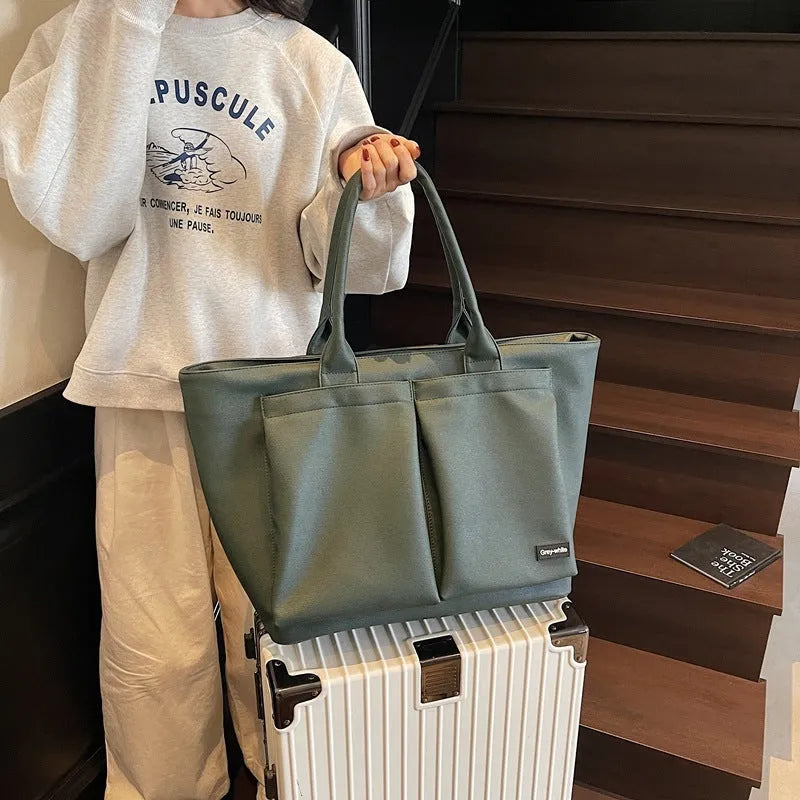 Lightweight PU shoulder bag in solid colour with ventilation, shown in black, green, or white.