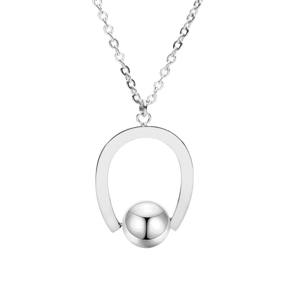 Gold stainless steel geometric pendant necklace on a cross chain, adjustable from 21cm to 50cm