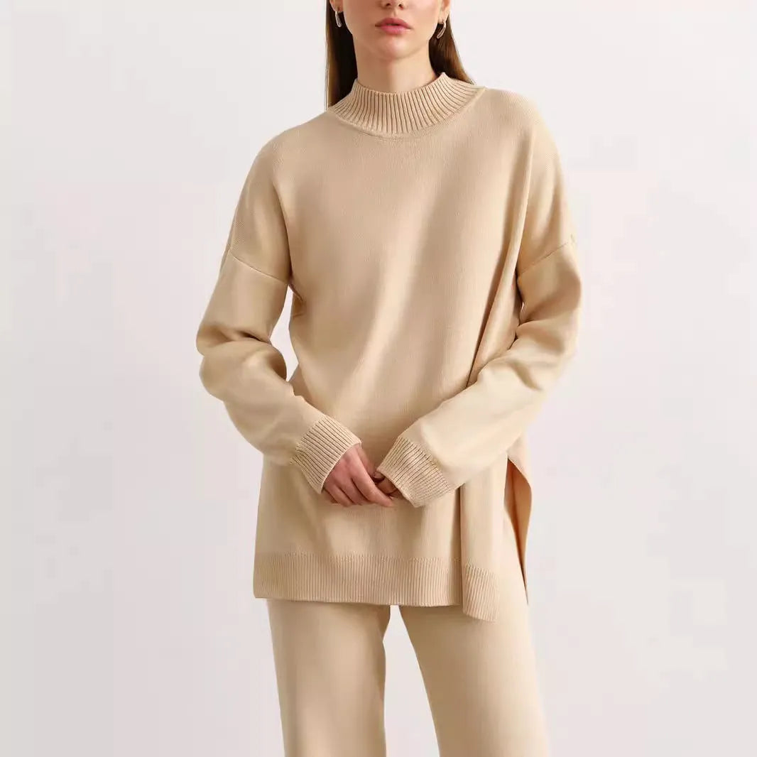 Women's turtleneck knit sweater suit set in solid colour with long sleeves and matching trousers on display