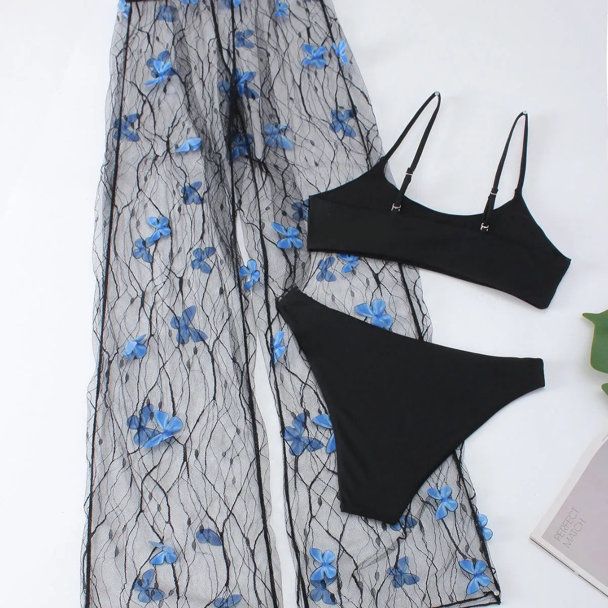 Black transparent voile bikini set with butterfly pattern showing top, underwear and pants pieces