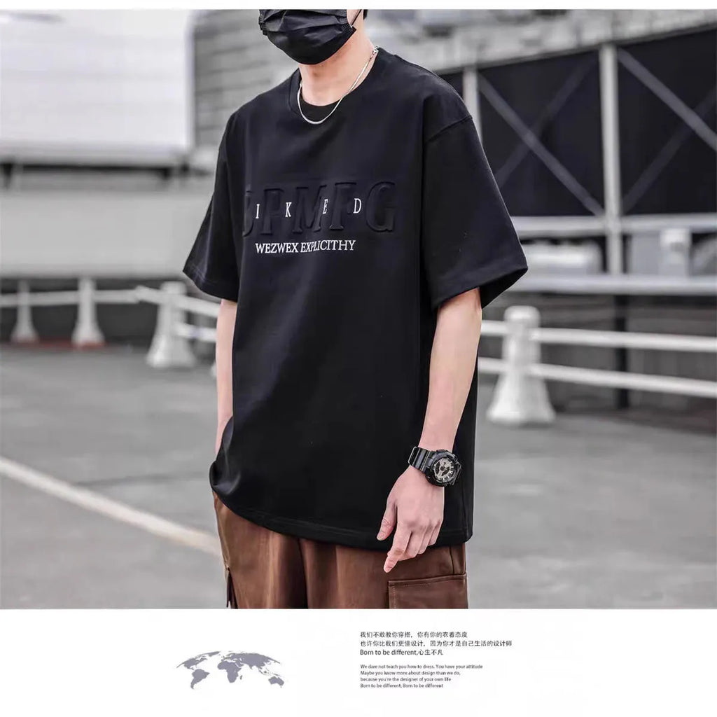 Men's short sleeve simple printed top in combed cotton available in brown, black, and white