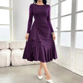 Purple women's long sleeve dress with ruffle detailing, round neck, and mid waist.