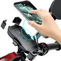 Black plastic motorcycle phone holder with wireless charging and 360-degree rotation mounted on a handlebar