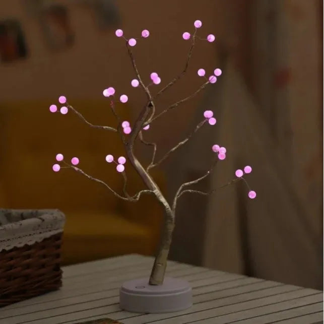 Tree light night light with bonsai-style design, warm white LED lights, adjustable branches, and USB plug.