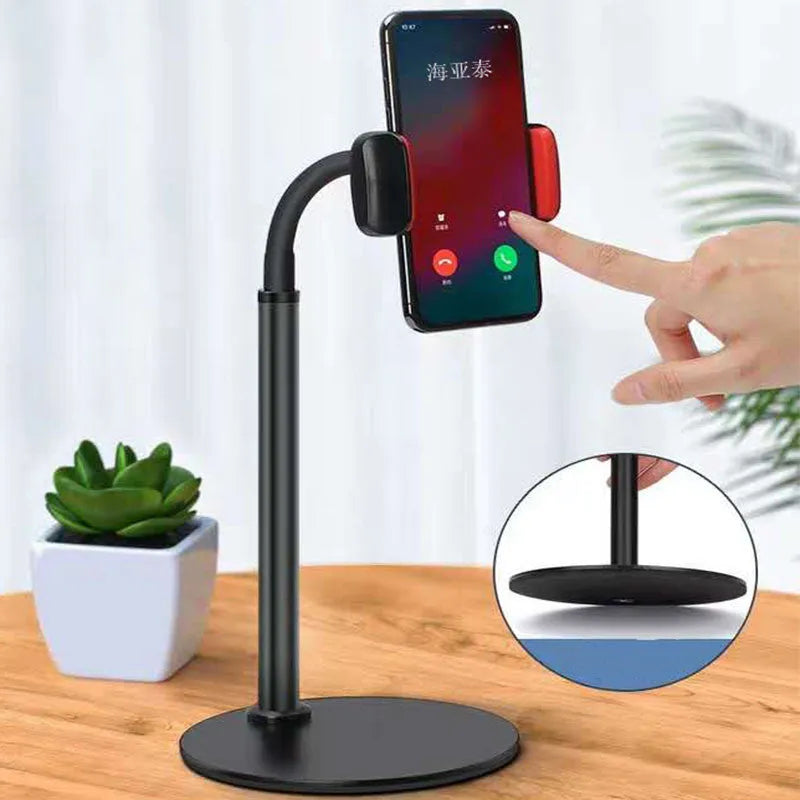 Lazy desktop stand holding a mobile phone on a desk, silicone tube and aluminium alloy construction